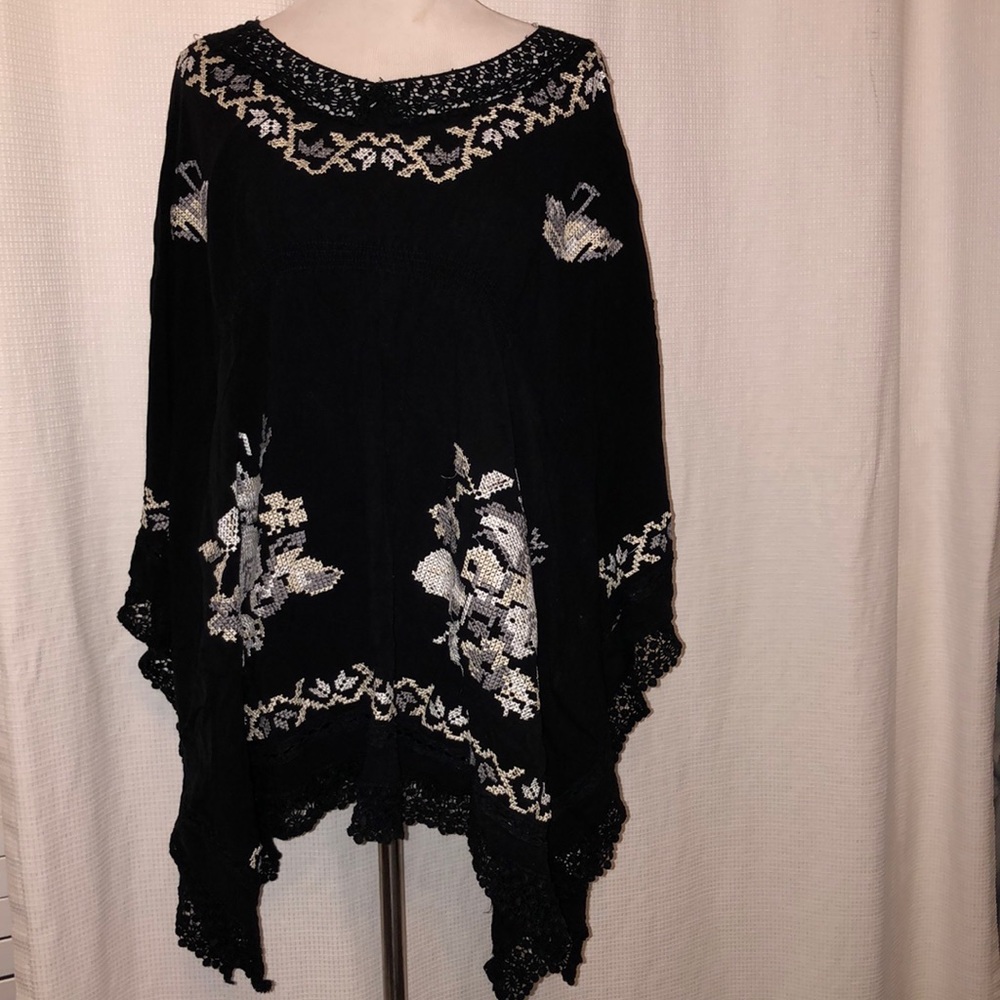 Black and white embroidered top.  size large